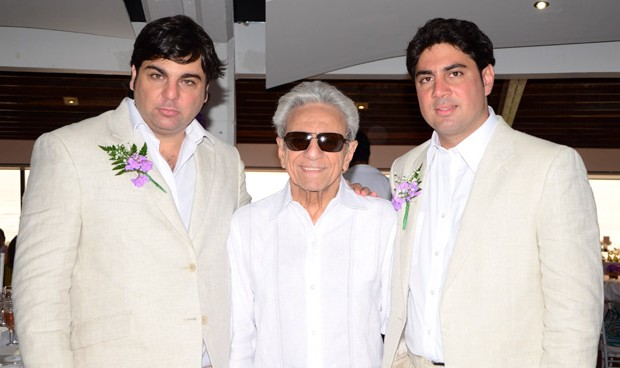 William Mebarak Chadid with his sons in white suits.